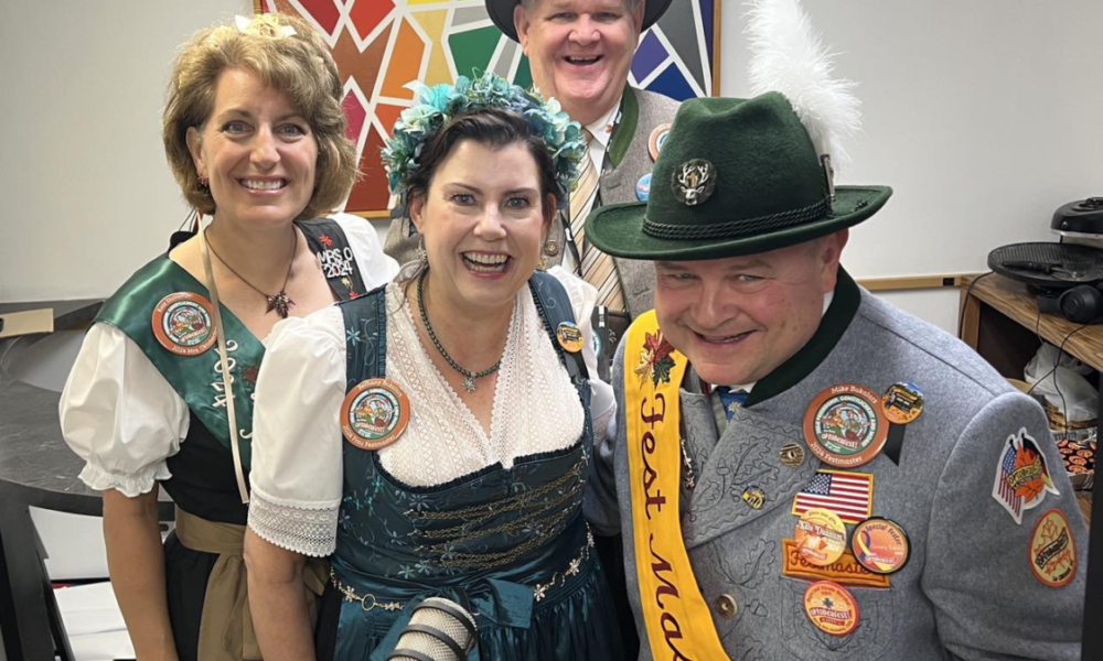 The Oktoberfest La Crosse family in the WIZM studio, including Festmaster and wife, the Bakalars